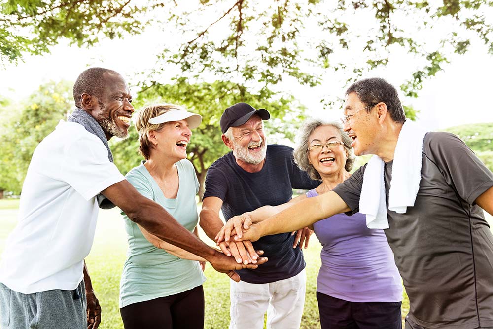 Group Of Happy Seniors Exercising Togethern